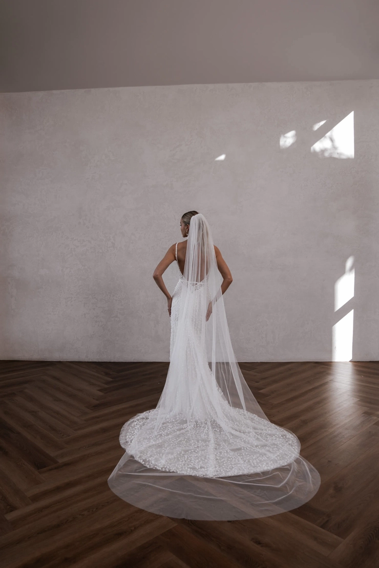green emerald velvet dress Louie Flowy | Novelle Bridal Shop