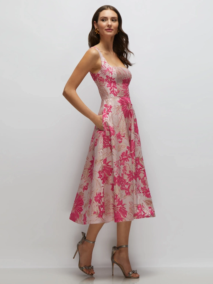 jacquard bridesmaid dress Desiree in bra cups and vertical boning for support Strapless Pockets at the natural hip line Slit on the left front of the skirt Full Hannah Floor-Length Pink Garden Floral