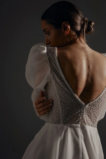 Olivia Bottega April #20 backface vertical cropped thumbnail