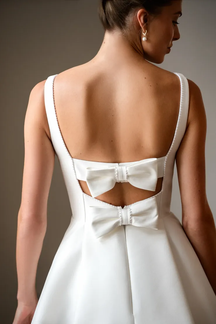 Kelly Faetanini Rayna #3 backface vertical cropped picture