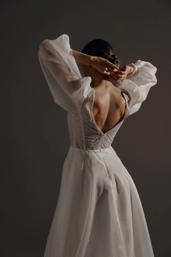Olivia Bottega April #21 backface vertical cropped thumbnail
